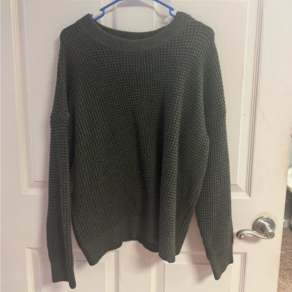 green sweater